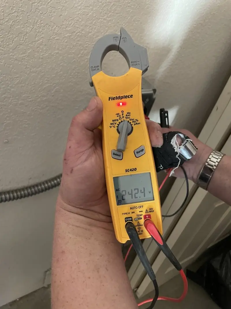 Voltage testing with clamp meter during Aluminum Wiring Replacement in Highlands